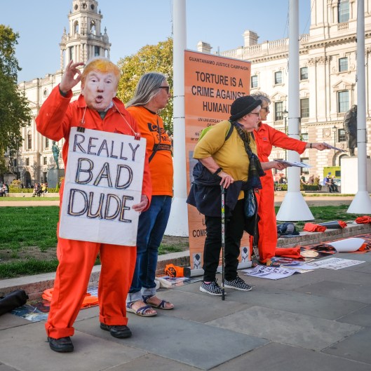 Anti-torture protestor in Trump mask in Parliament Square